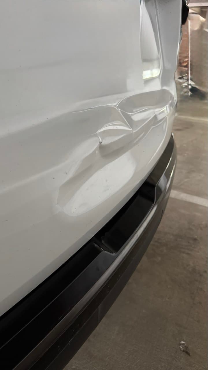 Tailgate Dent — before repair