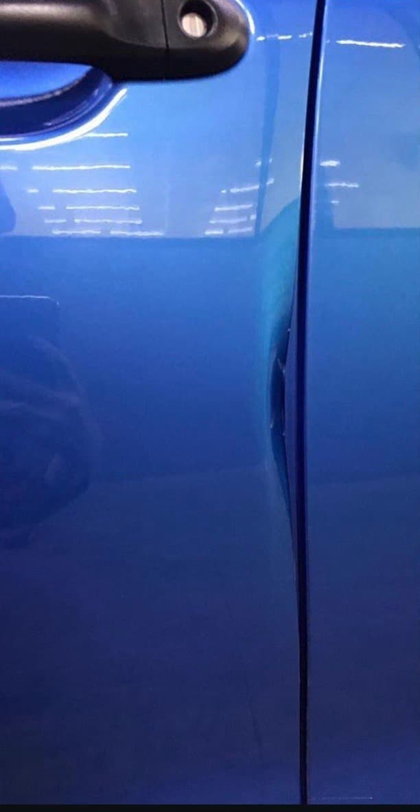Door Edge Dent — before repair